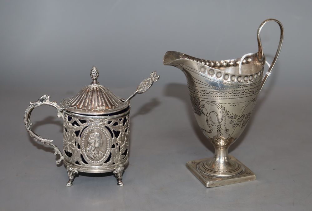 An early 20th century German pieced silver mustard and jug
